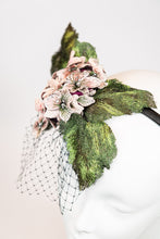 Load image into Gallery viewer, Fascinator headpiece with pink hydrangeas, large green leaves, and black birdcage netting