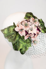 Load image into Gallery viewer, Fascinator headpiece with pink hydrangeas, large green leaves, and black birdcage netting